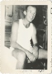 Man in an Undershirt and Boxers in His Bunkroom