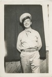 United States Air Force Airman in Uniform, Posing in Front of a Cloth or Curtain