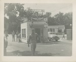 Entrance to Keesler Field with Uniformed Airmen Walking