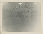 Airmen Seated at the Counter of The Atomic Good Food Restaurant