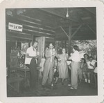 People on a Service Station Porch