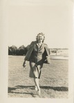 Woman Walking in a Field