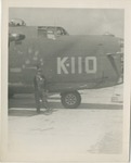 United States Air Force Airmen in Front of K-110 Airplane on the Tarmac