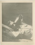 United States Airforce Airman in Uniform, Resting on His Bunk