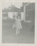 Young Girl Posing in a Yard