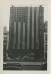United States Flag Covering a Building
