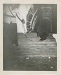 Man Leading a Bear