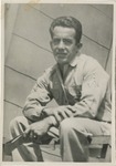 United States Airforce Airman in Uniform, Seated in a Chair