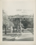 United States Air Force Airmen Standing in Front of the Great Southern Hotel