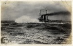 Navy Ship with Two Cage Masts and Smoke From the Funnels/Stacks in Rough Water