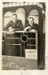 Sailors in Uniform in front of a Los Angeles Limited Sign
