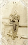 Sailor in Dark Uniform on a Ship