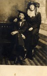 Sailor and a Lady Seated on a Bench