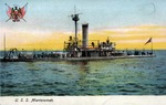 United States Ship Miantonomah on the Water at Sunset While Sailors are on Deck