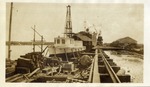 Boat and Building Materials in a Shipyard