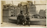 Men Wearing Boxing Gloves on a Navy Ship