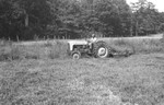 Man on tractor by Howard Langfitt