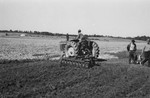 African American man on tractor by Howard Langfitt