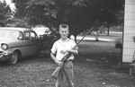Boy and gun by Howard Langfitt