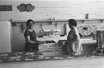 Women canning in club house kitchen [Slide Farm-21] by Howard Langfitt