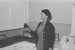 Woman in kitchen by Howard Langfitt