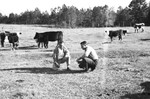 Two men in pasture by Howard Langfitt