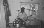 African American Man In Barn [Slide Farm9] by Howard Langfitt