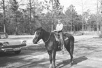 Boy on horse by Howard Langfitt