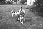 Man with dogs by Howard Langfitt