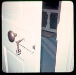 Exterior door with brass lock and key by Doy Payne Longest