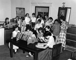 Children at the Library by Gulfport Photo-Movie Service.