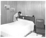 Woman Making Bed