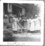 Women With Chairs Outside