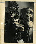 Woman Standing at an Ornate Organ, undated