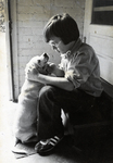 Gilbert Scott Carmichael with a Puppy