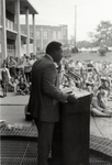 Charles Evers Speaking From Behind a Podium