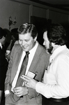Doug Shanks Speaking with an Unidentified Man