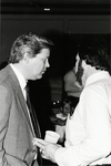 Doug Shanks Speaking with an Unidentified Man