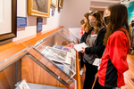 Students Observing Display by Mississippi State University Libraries
