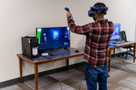 Student in CAVS Mixed Reality Studio by Mississippi State University Libraries