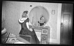Woman in Dark Dress with Reflection in Mirror by Fred A. Blocker