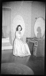 Woman Posing in front of Vanity by Fred A. Blocker