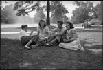 Students Sitting in the Grass by Fred A. Blocker