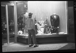 Man Looking in Smith & Byars Store Window by Fred A. Blocker