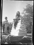 Beth York, Block & Bridle Queen on Ag Festival Float by Fred A. Blocker