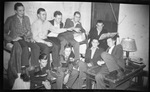 Group of Students in Dorm Room by Fred A. Blocker