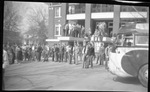 Students in front of YMCA Building Waiting for Bus by Fred A. Blocker
