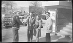 Students Shaking Hands in front of YMCA Building by Fred A. Blocker