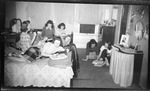 Students Having Study Session in Dorm Room by Fred A. Blocker