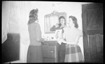 Students Getting Ready in Dorm Room by Fred A. Blocker